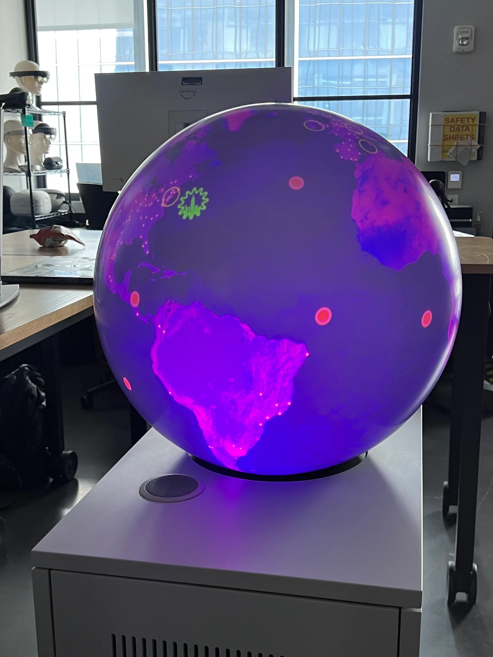 Colourful interactive content on Accenture's spherical display